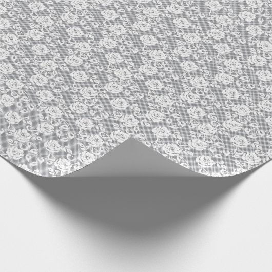 Witte kant patroon op grijze achtergrond cadeaupapier (Hoek)