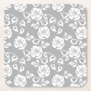 Witte kant patroon op grijze achtergrond kartonnen onderzetters