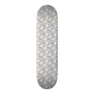 Witte kant patroon op grijze achtergrond skateboard