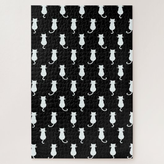 Witte kat geïsoleerd op zwart stippenpatroon legpuzzel (Verticaal)