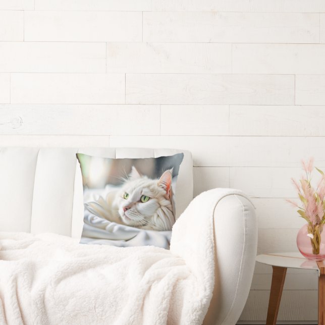 Witte kat in een witte deken kussen (Bank)