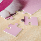 Witte kat in verward in roze linten legpuzzel (Zijkant)