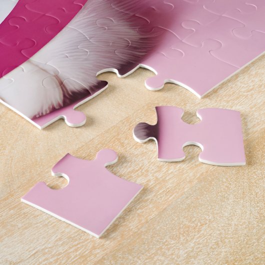 Witte kat in verward in roze linten legpuzzel (Zijkant)