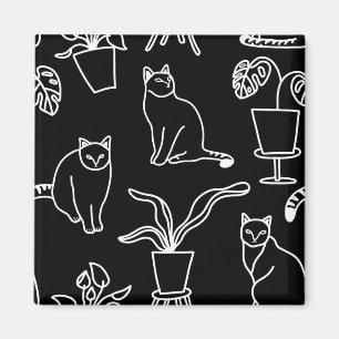 Witte katten op zwart magneet