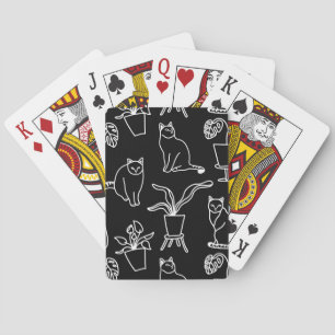 Witte katten op zwart pokerkaarten