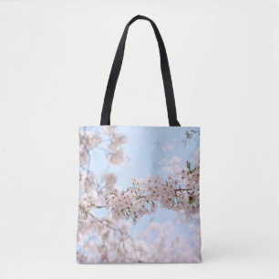 Witte kersen bloesem onder heldere blauwe hemel in tote bag