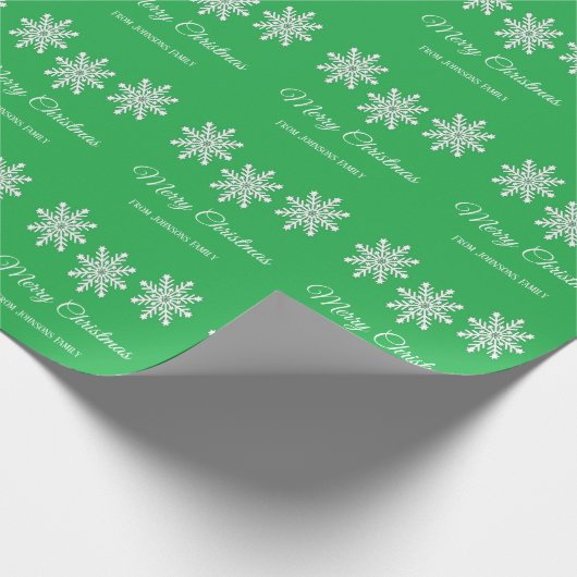 Witte kerst sneeuwvlokken Vrolijk kerstgroen Cadeaupapier (Hoek)