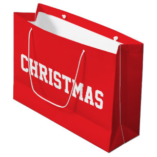 Witte KERST Vette Tekst Op Feestelijke Helder Rode Groot Cadeauzakje