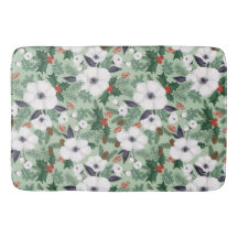 Witte kerstbloemen en rode bessen