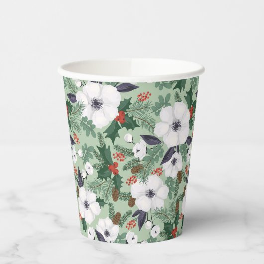 Witte kerstbloemen en rode bessen papieren bekers (Links)