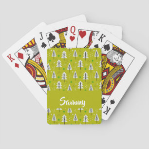 Witte kerstbomen op groen pokerkaarten