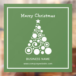 Witte kerstboom op groene ondergrond raamsticker