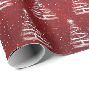 witte kerstster boom op rood cadeaupapier