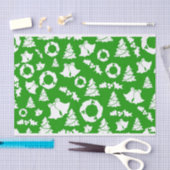 Witte kerstversieringen op groene achtergrond tissuepapier (Craft)