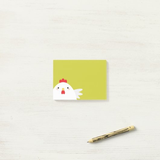 Witte kip op groen post-it® notes (Op bureau)