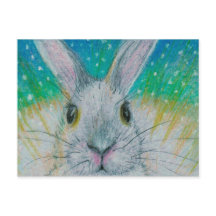 Witte konijn in de sneeuw.