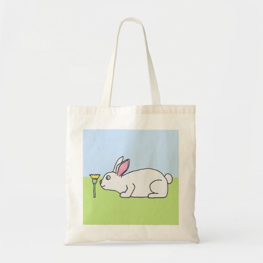 Witte konijn. Op een gazon. Tote Bag (Voorkant)