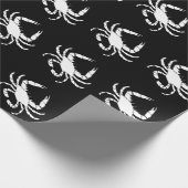 Witte krab op zwart cadeaupapier (Hoek)