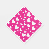 Witte krijtharten op fuchsia roze servet (Hoek)