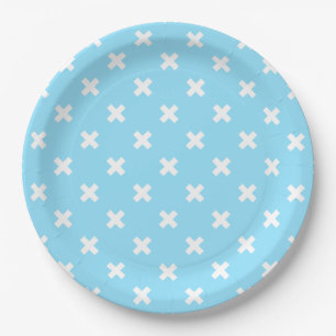 Witte kruisstiften op babyblauw papieren bordje
