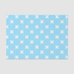 Witte kruisstiften op babyblauw tissuepapier