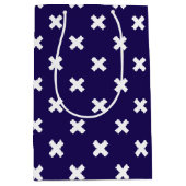 Witte kruisstiften op blauw van de marine medium cadeauzakje (Voorkant)