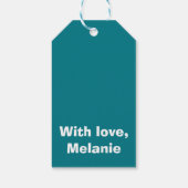 Witte kruisstiften op blauwgroen cadeaulabel (Achterkant)