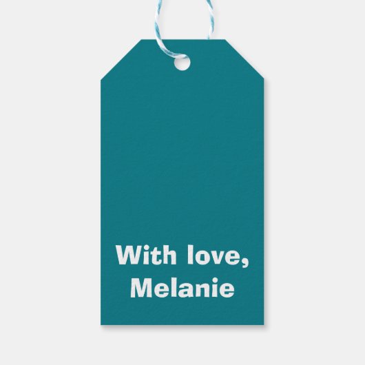 Witte kruisstiften op blauwgroen cadeaulabel (Achterkant)