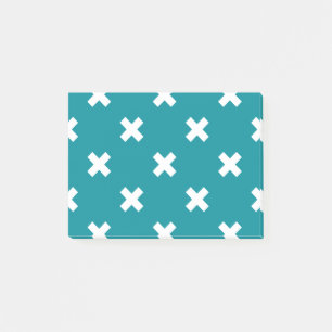 Witte kruisstiften op blauwgroen post-it® notes