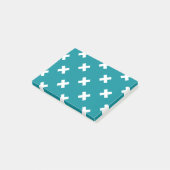 Witte kruisstiften op blauwgroen post-it® notes (Schuin)