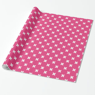 Witte kruisstiften op fuchsia cadeaupapier
