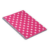 Witte kruisstiften op fuchsia notitieboek (Rechterzijde)