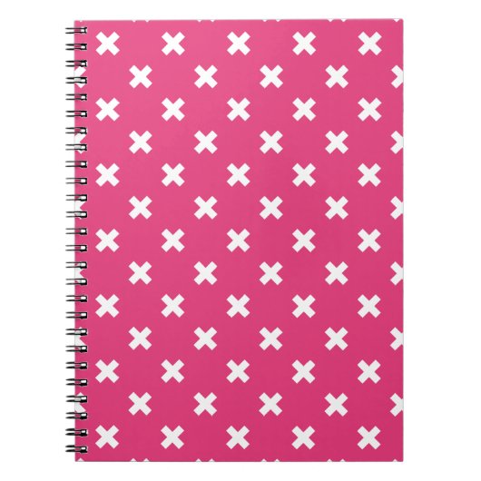 Witte kruisstiften op fuchsia notitieboek (Voorkant)