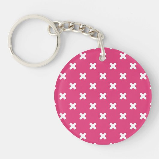 Witte kruisstiften op fuchsia sleutelhanger (Voorkant)