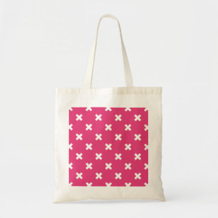 Witte kruisstiften op fuchsia tote bag