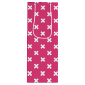 Witte kruisstiften op fuchsia wijn cadeautas (Voorkant)