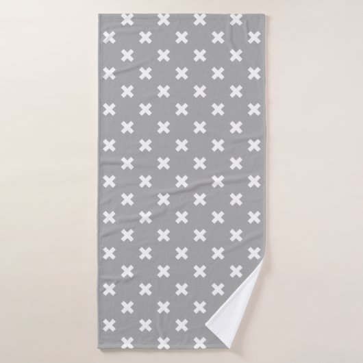 Witte kruisstiften op grijs badhanddoek (Badhanddoek)