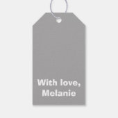 Witte kruisstiften op grijs cadeaulabel (Achterkant)