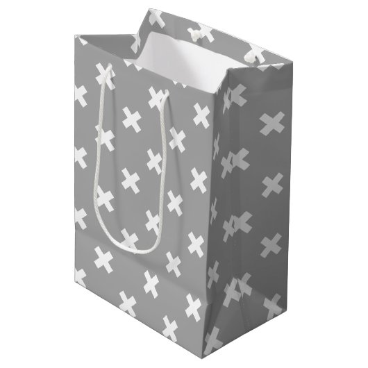 Witte kruisstiften op grijs medium cadeauzakje (Voorkant Gekanteld)