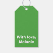 Witte kruisstiften op groen cadeaulabel (Achterkant)