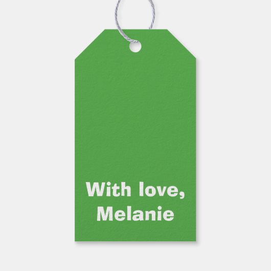 Witte kruisstiften op groen cadeaulabel (Achterkant)