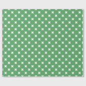 Witte kruisstiften op groen cadeaupapier (Vlak)