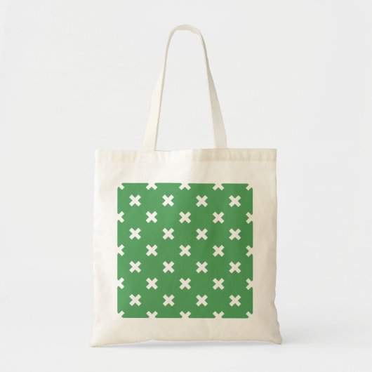 Witte kruisstiften op groen tote bag (Voorkant)