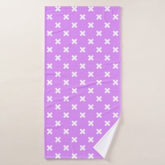 Witte kruisstiften op lila badhanddoek (Badhanddoek)