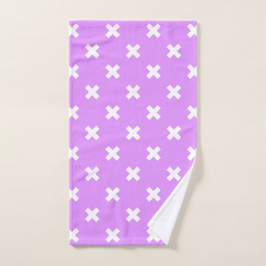 Witte kruisstiften op lila handdoek (Handdoek)