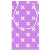 Witte kruisstiften op lila klein cadeauzakje (Achterkant)