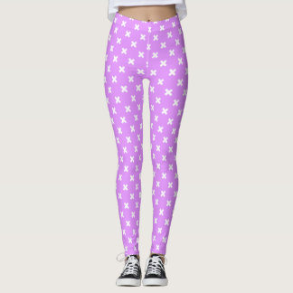 Witte kruisstiften op lila leggings