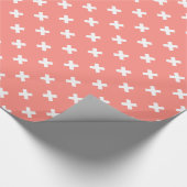 Witte kruisstiften op perziken cadeaupapier (Hoek)