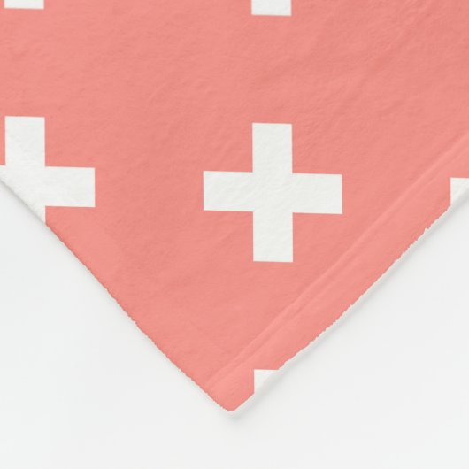 Witte kruisstiften op perziken fleece deken (Hoek)
