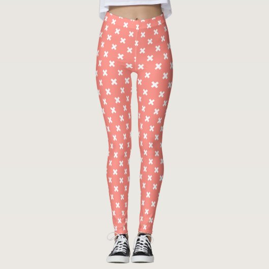 Witte kruisstiften op perziken leggings (Voorkant)